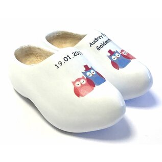 birth clogs with a name and date or an image.