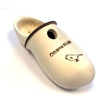 Wooden shoe birdhouse with engraving