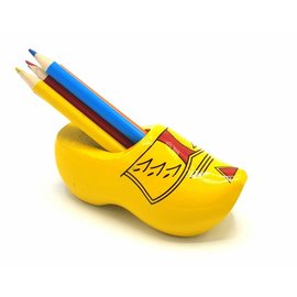 Clog sharpener yellow with stripes with colored pencils.