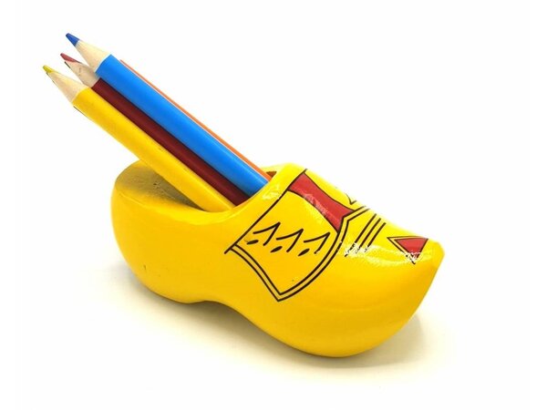 Clog sharpener yellow with stripes with colored pencils. Clog sharpener yellow with stripes with colored pencils.