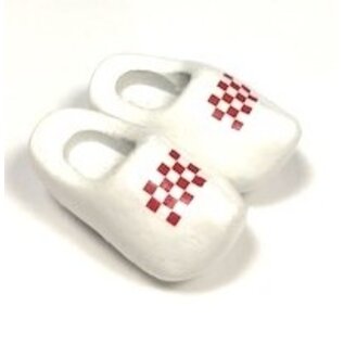 Souvenir clogs on a magnet with flag