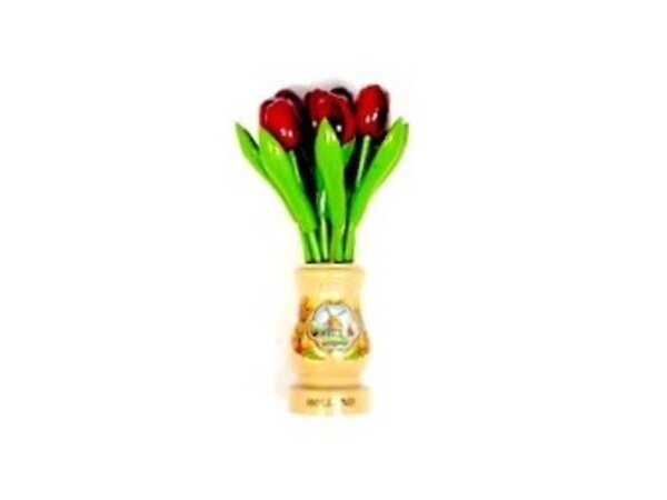 red wooden tulips in a transparent wooden vase