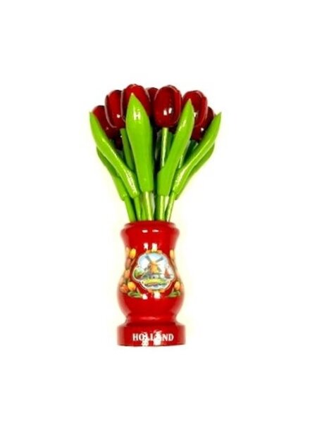 Red wooden tulips in a red wooden vase