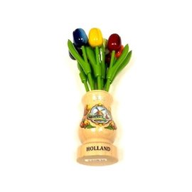 Mixed wooden tulips in a transparent wooden vase