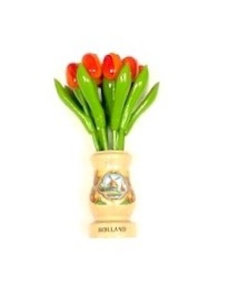 Orange wooden tulips in a transparent wooden vase