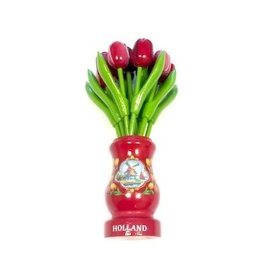 mixed red wooden tulips in a red wooden vase