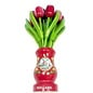 mixed red wooden tulips in a red wooden vase