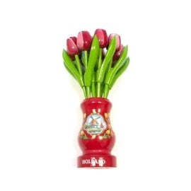 red-white wooden tulips in a red wooden vase