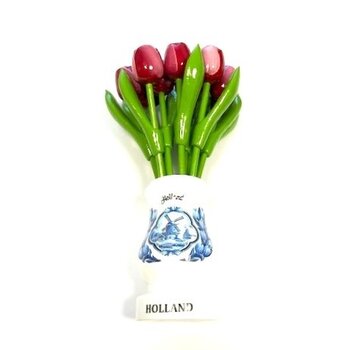 Red-white wooden tulips in a white wooden vase