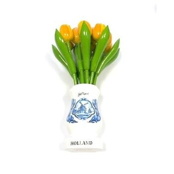 Yellow wooden tulips in a white wooden vase