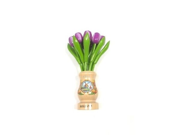 Purple wooden tulips in a transparent wooden vase