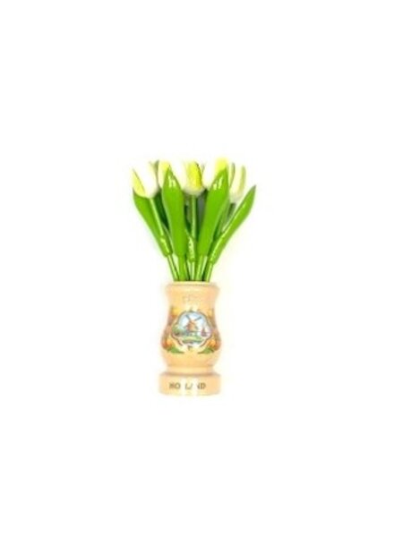 White wooden tulips in a transparent wooden vase