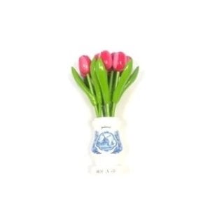 Pink-white wooden tulips in a white wooden vase