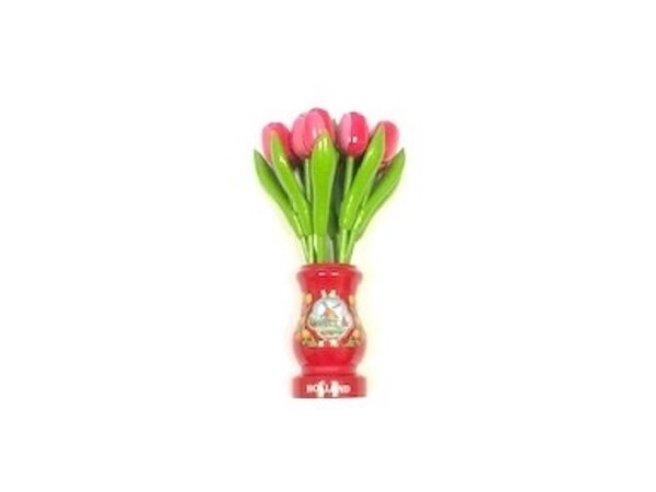 Pink-white wooden tulips in a red wooden vase