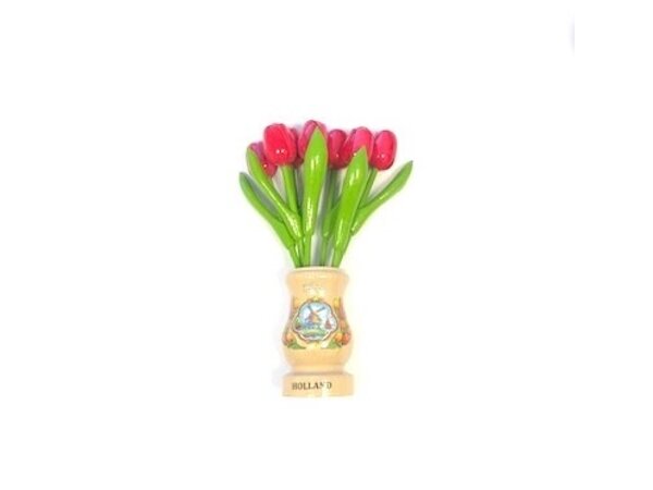 Pink wooden tulips in a transparent wooden vase