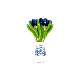 Blue wooden tulips in a white wooden vase