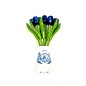 Blue wooden tulips in a white wooden vase