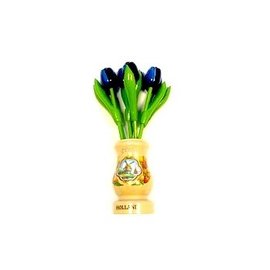 Blue wooden tulips in a transparent wooden vase