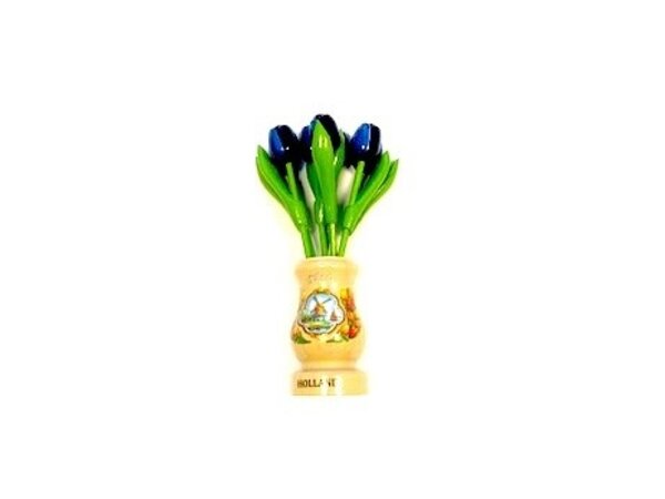 Blue wooden tulips in a transparent wooden vase