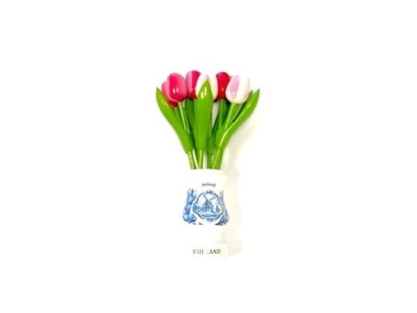 Mixed pink wooden tulips in a white wooden vase