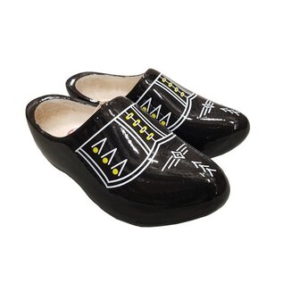 Black wooden shoes with white piping