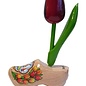 Wooden tulip on a wooden shoe with logo