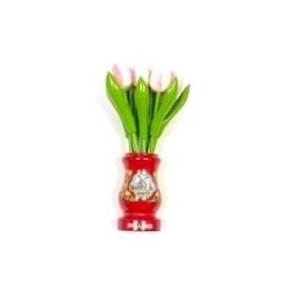 White-pink wooden tulips in a red wooden vase