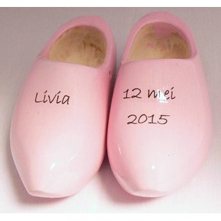birth clogs with a name and date or an image.