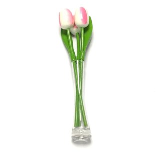 3 white - pink wooden tulips in a glass vase