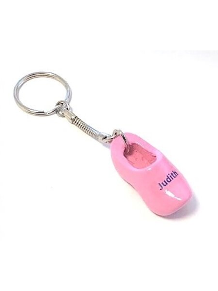Keychain with a clog with text