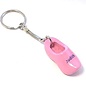 Keychain with a clog with text