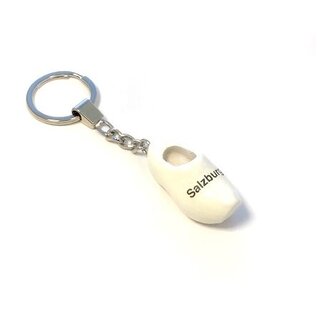 Keychain with a clog with text