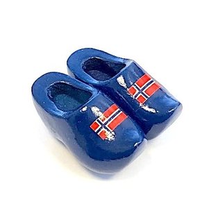 Souvenir clogs on a magnet with flag