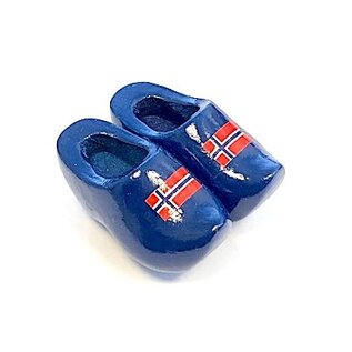 Souvenir clogs on a magnet with flag
