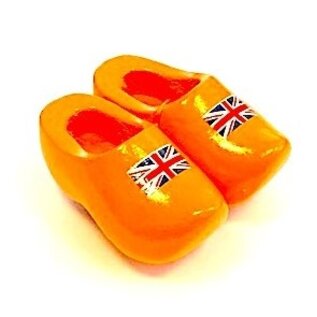 Souvenir clogs on a magnet with flag