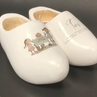 birth clogs with a name and date or an image.