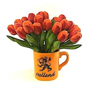 Wooden tulips in a lion cup