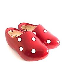 Kinderklompen met stippen in alle kleuren.