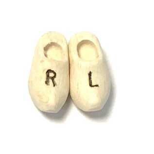 Corsage with orange clogs with text