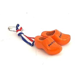 Corsage with orange clogs with text