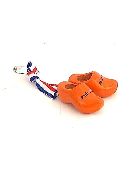Corsage met oranje klompjes met tekst