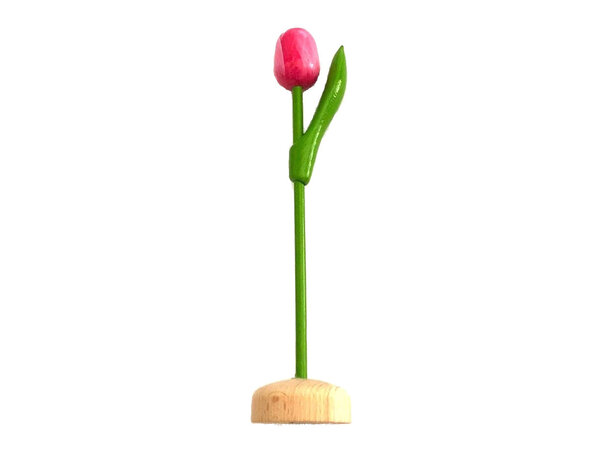 Pink white wooden tulip on a foot