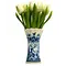  White wooden tulips in a Delft blue vase