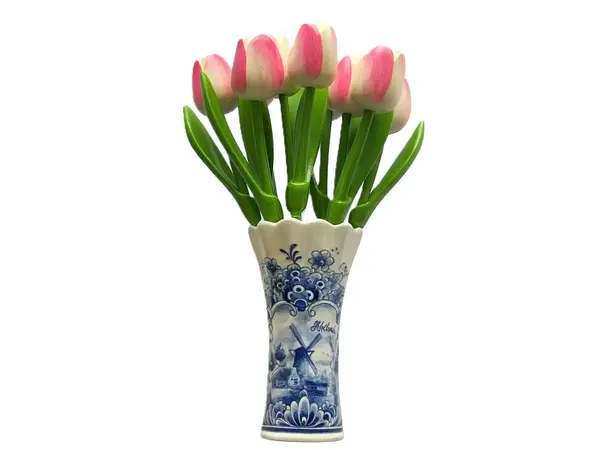 Wit-roze houten tulpen in een Delfts blauwe vaas