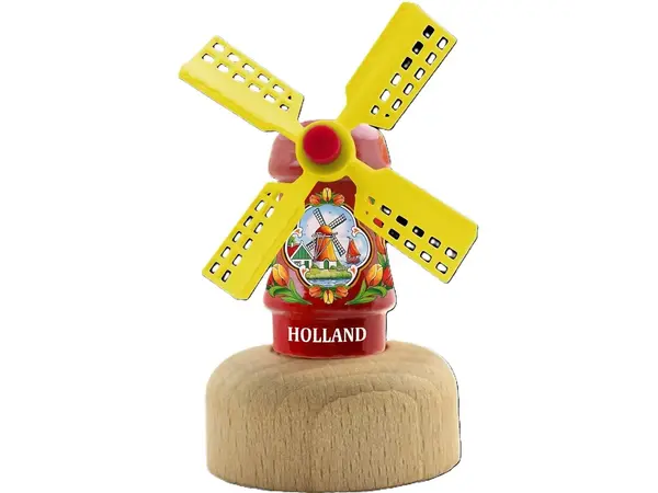 Rode houten molen op een terp