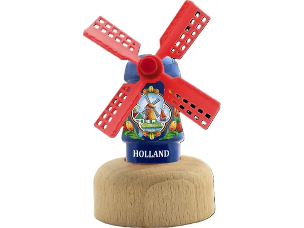 Blauwe houten molen op een terp