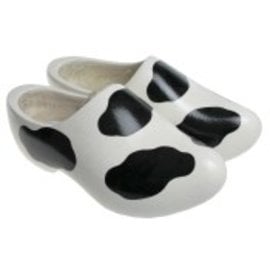 Wooden shoes with cow spots