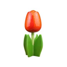 Orange wooden tulip on a leaf