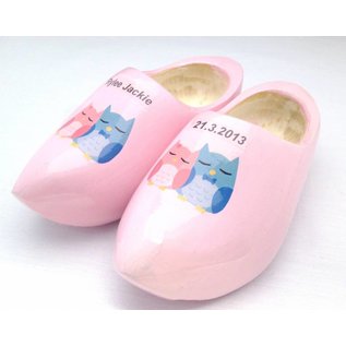 birth clogs with a name and date or an image.