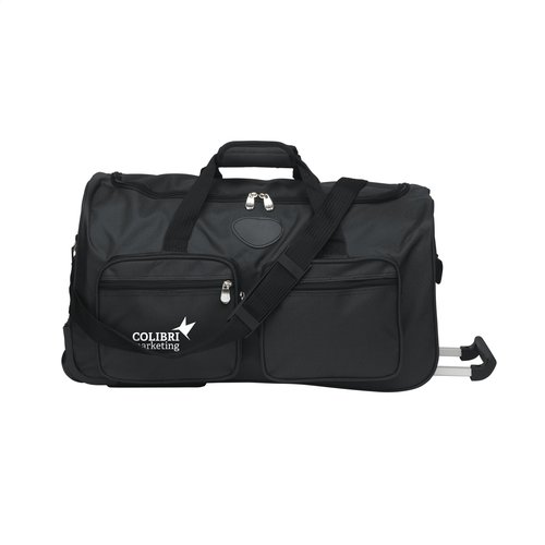 <p>Wil je een <strong>Milaan trolleytas bedrukken met logo</strong>? De 268126 is een ruime zachte trolleytas van duotone 600D polyester met circa 31,5 liter inhoud. Het grote hoofdvak, vier ritsvakken aan de voorzijde, twee wielen en de uitschuifbare handgreep maken dit model praktisch voor zakelijke trips, weekendjes weg en personeelsreizen.</p> <p> </p> <h2>31,5 liter voor korte reizen en overnachtingen</h2> <p>Met circa 31,5 liter inhoud biedt de Milaan ruimte voor kleding, schoenen en andere persoonlijke reisbenodigdheden voor een korte reis of zakelijke overnachting.</p> <p>De afmetingen van 57 x 30 x 30 cm maken dit een relatief ruime zachte trolley. Wil je de tas meenemen als handbagage in het vliegtuig, controleer dan altijd vooraf de actuele afmetingen en gewichtsregels van de luchtvaartmaatschappij.</p> <p> </p> <h2>Groot hoofdvak met vier ritsvakken</h2> <p>Het ruime hoofdcompartiment biedt plaats aan de grotere bagage. Aan de voorzijde zitten daarnaast vier aparte vakken m